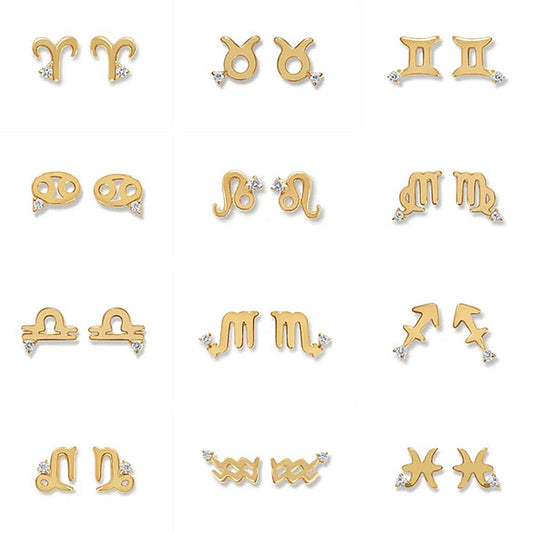 Gold stud style earrings representing each sign of the astrological zodiac. Each of the earrings have an imitation diamond that is set on the outside corner. 