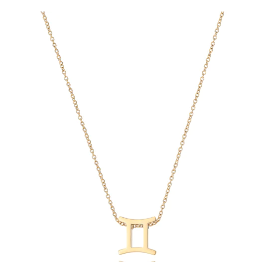 A dainty twist chain with a zodiac inspired pendant in the style of Gemini