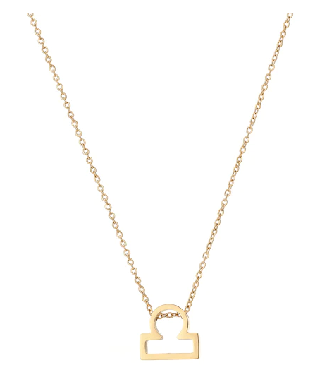 A dainty twist chain with a zodiac inspired pendant in the style of Libra